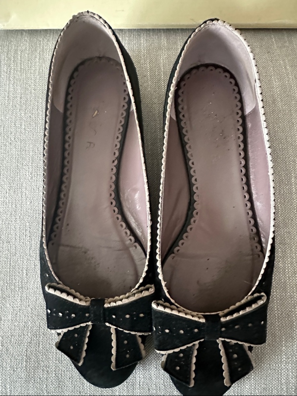 Unisa Black Suede Ballet Flats with Cream Trim and Bows